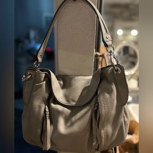 orYany leather bag is light gray!
